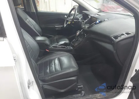 2014 Ford Escape Titanium z USA, uszkodzony, nr VIN 1FMCU9J90EUD21552